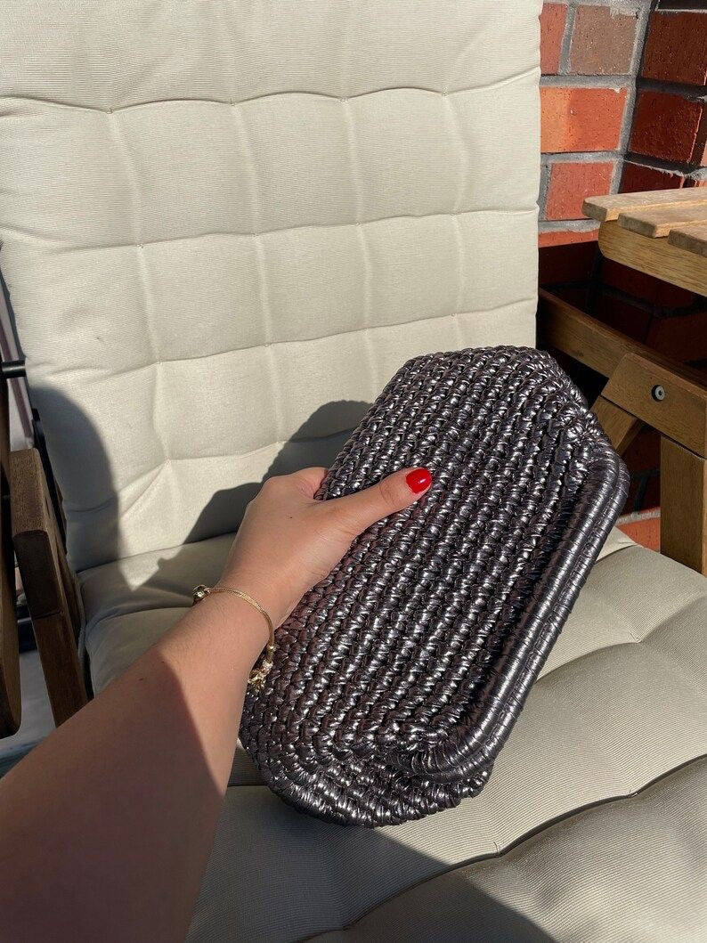The grey metallic clutch