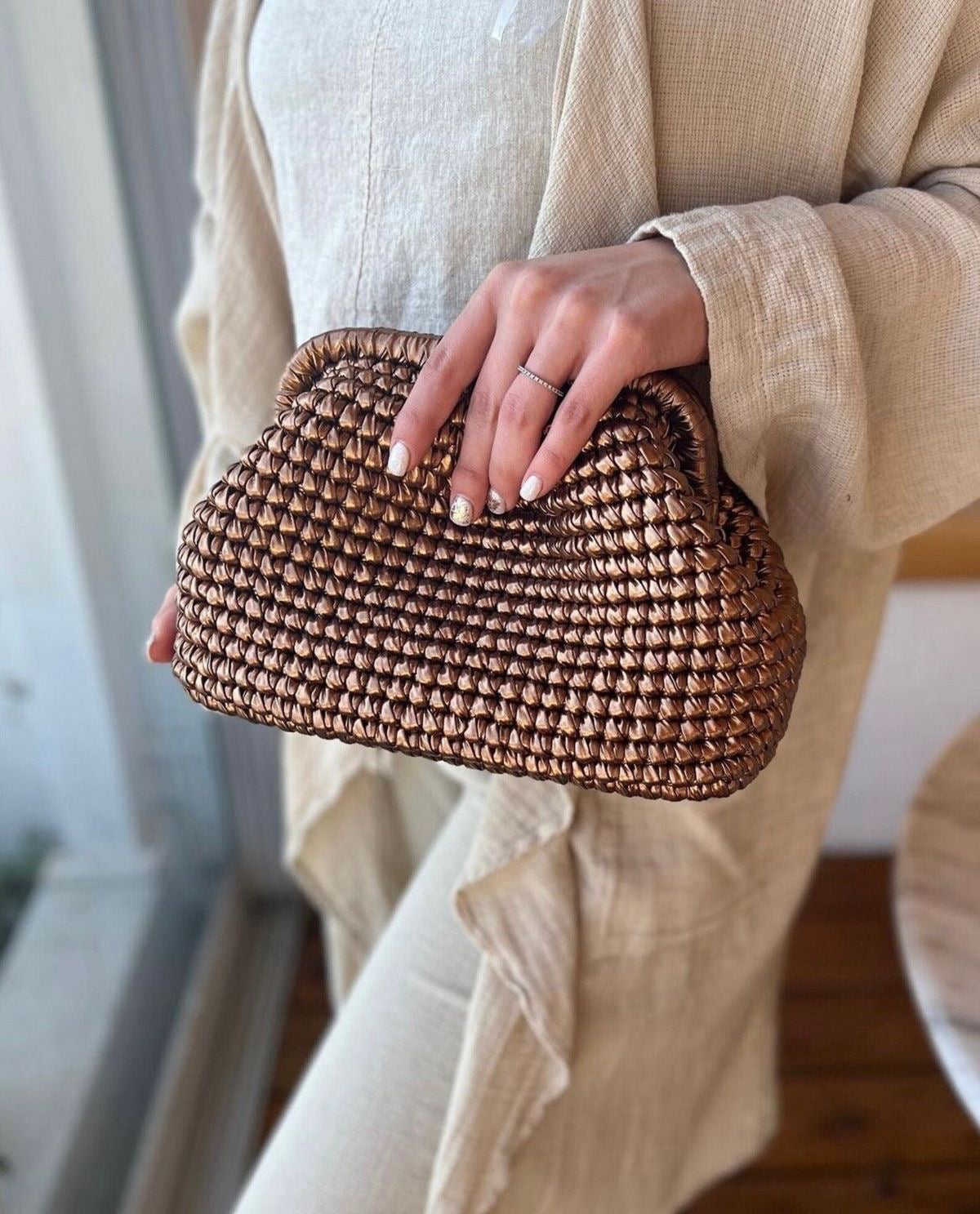 Bottega bronze metallic clutch bag