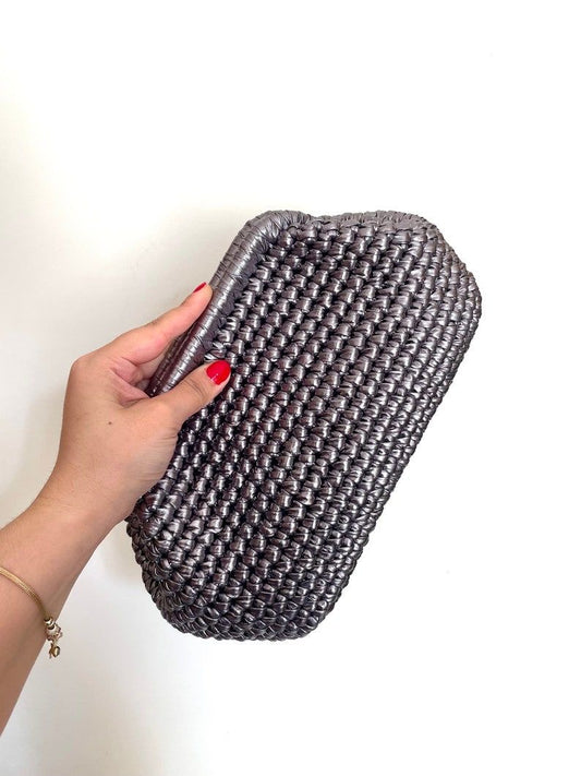 The grey metallic clutch